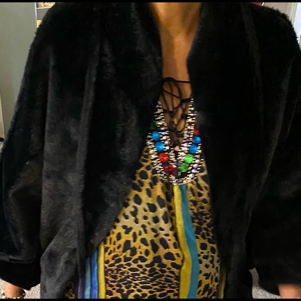Gently PREOWNED black L ladies cape style coat. With faux fur label